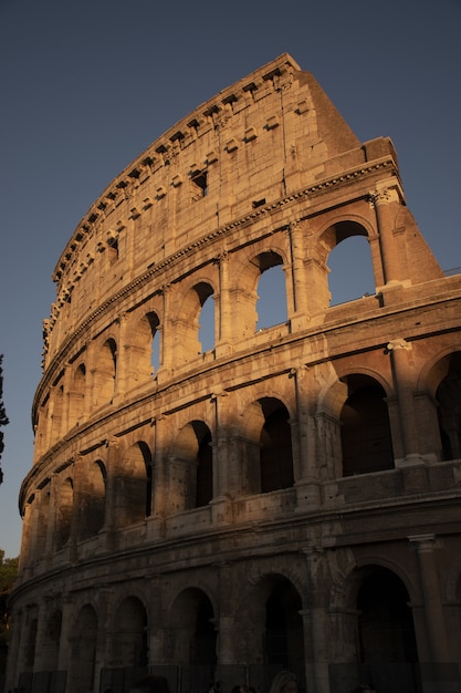 vertical shot famous colosseum rome italy sunset_181624 52589 1