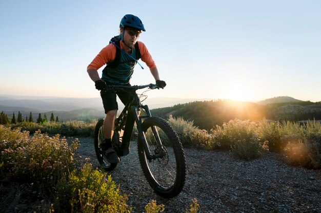 young adult using electric bike country side_23 2149124563